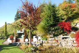 Garten mit Strandkorb durch Landschaftsgärtner bei 5020 Salzburg